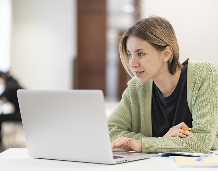 Woman working on a laptop