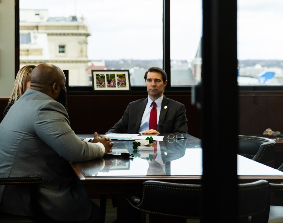 People talking to a senator during Advocacy Day